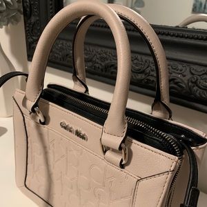 Light pink small Calvin Klein hand bag